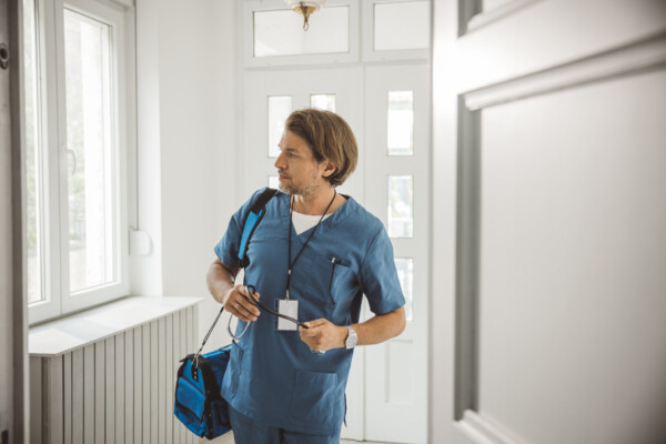 health-worker-working-alone-visiting-client-at-home